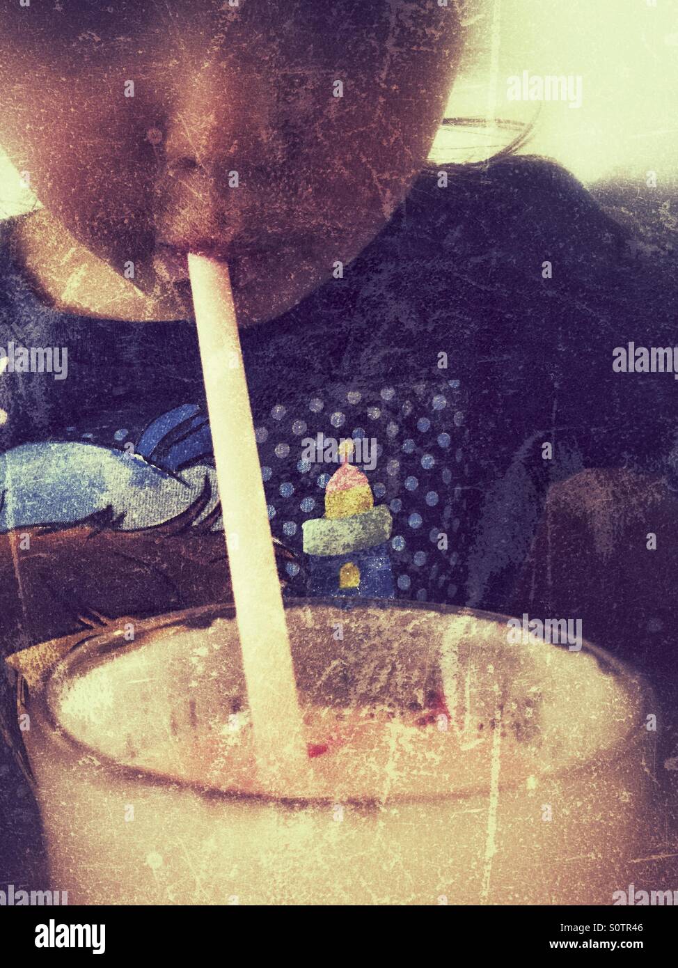 Drinking through a straw Stock Photo Alamy