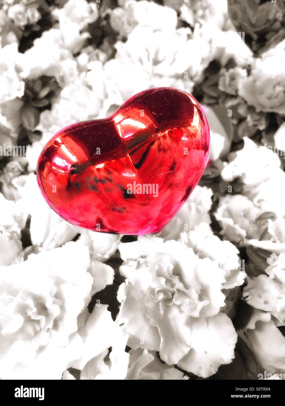 Heart shaped centerpiece in floral display Stock Photo Alamy