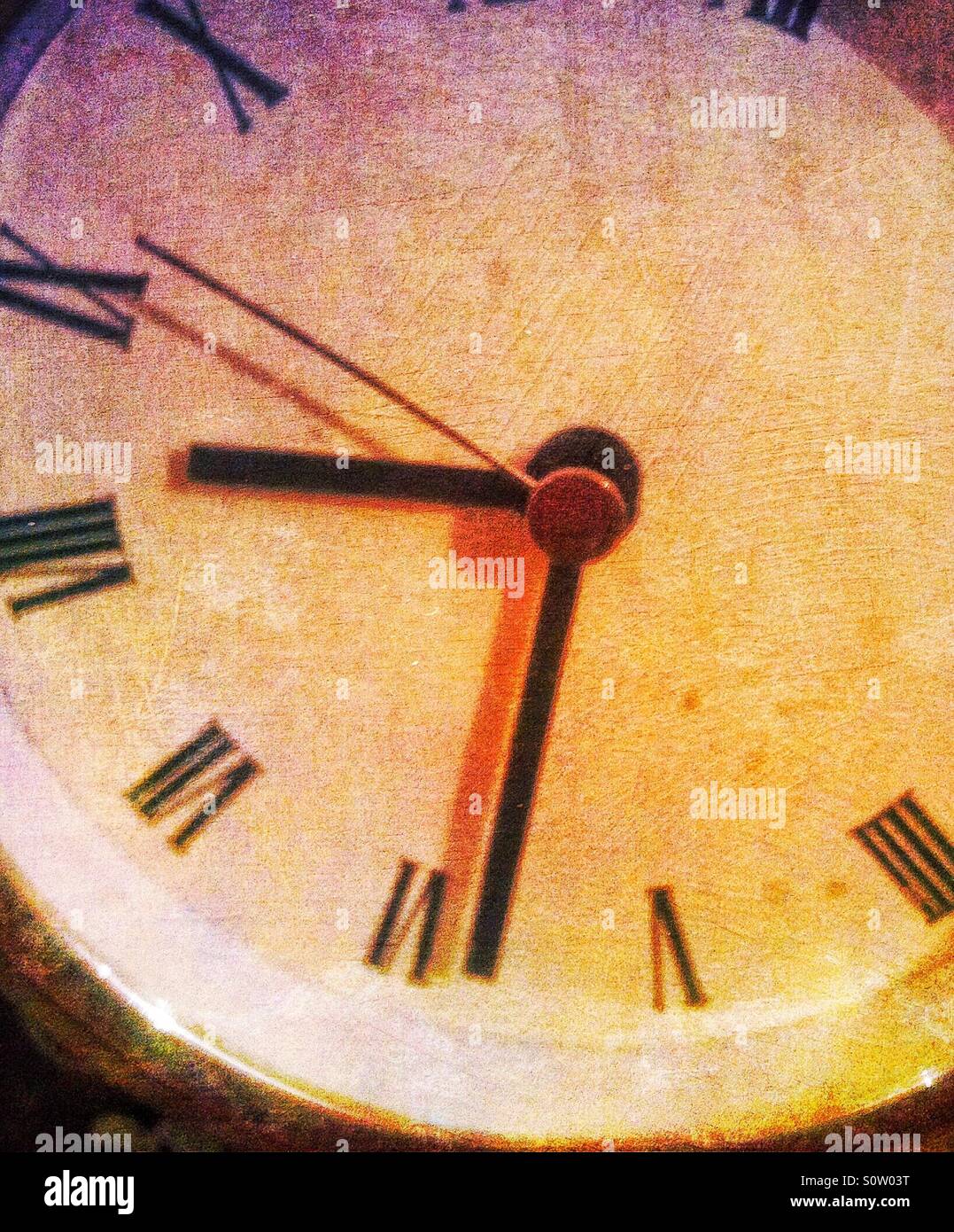 A close up of a clock face. - Smartphone Captured Stock Image