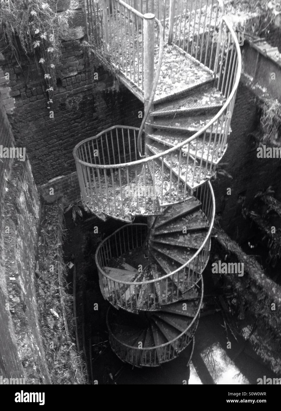 Spiral staircase in the derelict Wet Earth Colliery, Salford, England. - Smartphone Captured Stock Image