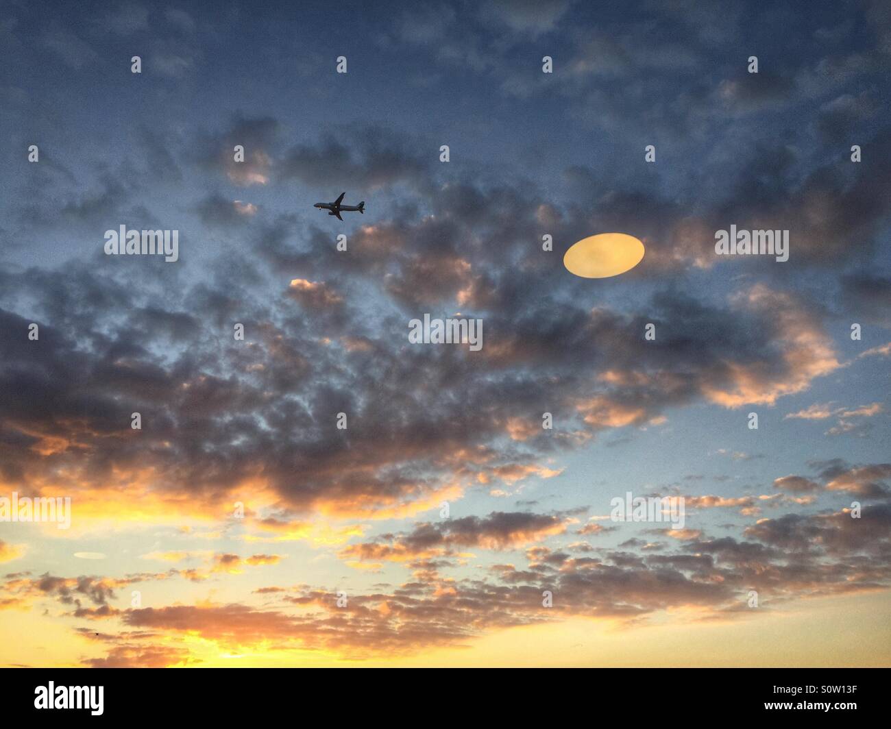 Airplane flying in Sky - Smartphone Captured Stock Image Airplane flying in Sky - Smartphone Captured Stock Image