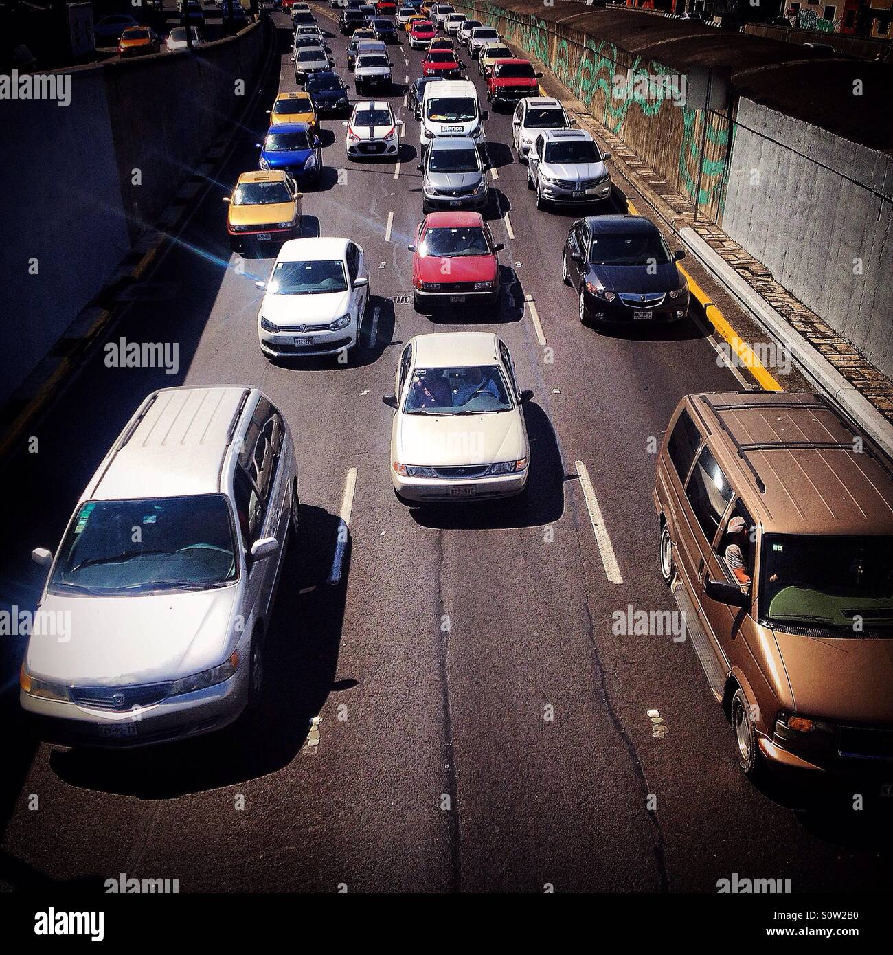 Cars in a traffic jam in Mexico City, Mexico. Cars and motorcycles kill 1.2 million people annually and injure 50 million worldwide; - Smartphone Captured Stock Image