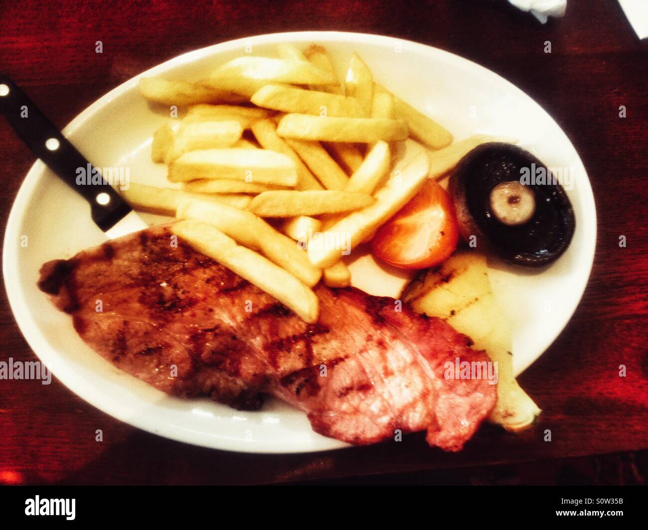 Gammon steak and chips. - Smartphone Captured Stock Image