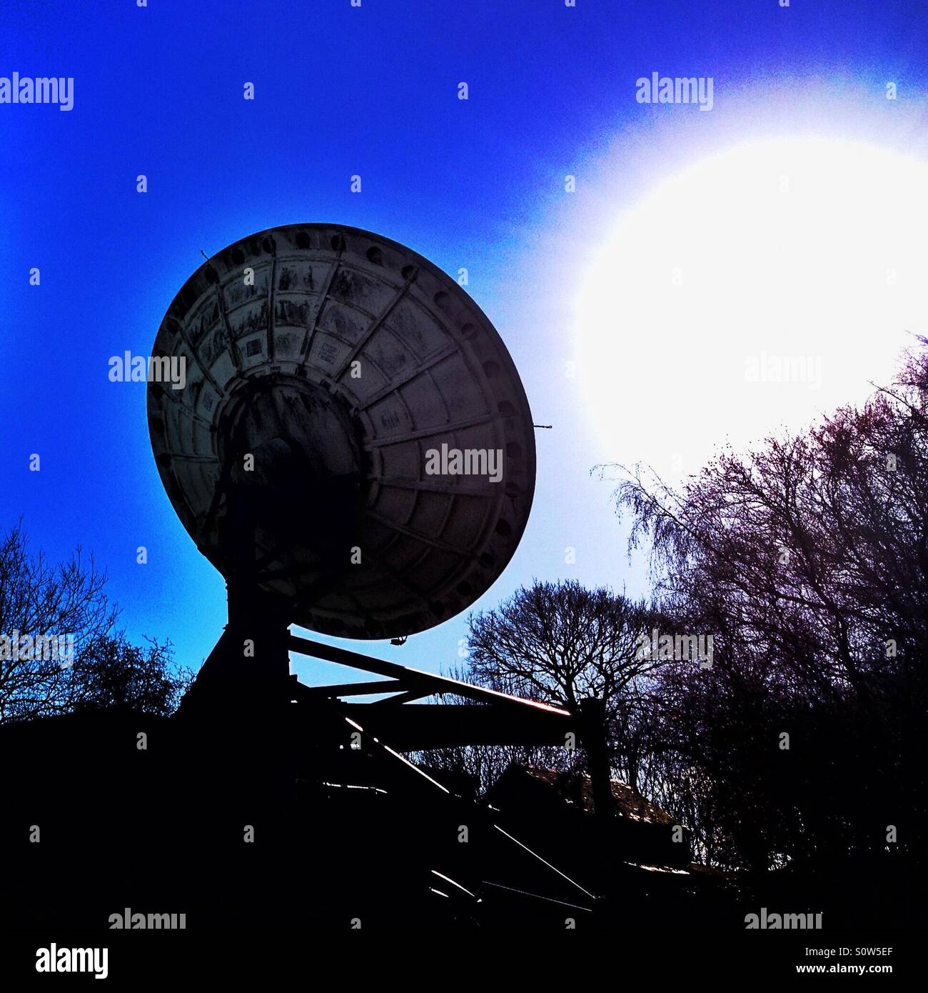 Satellite looking into the sun - Smartphone Captured Stock Image