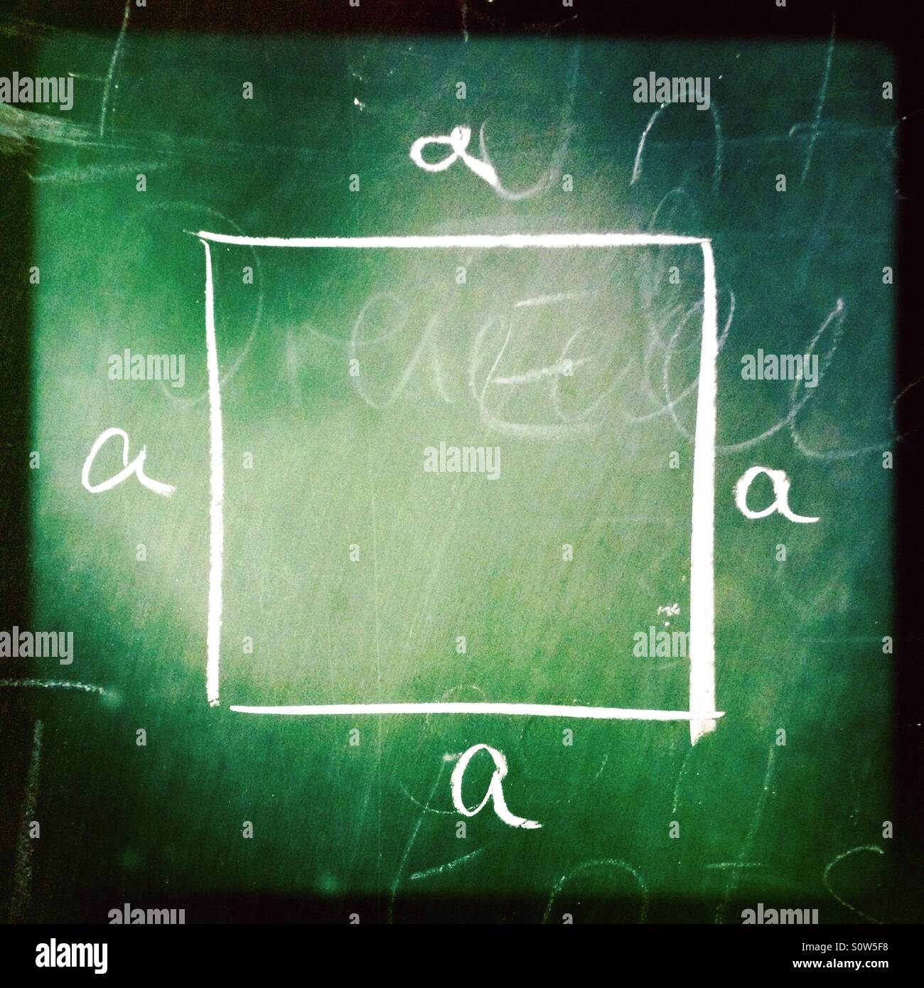 Square with four equal sides drawn on a green chalkboard - Smartphone Captured Stock Image
