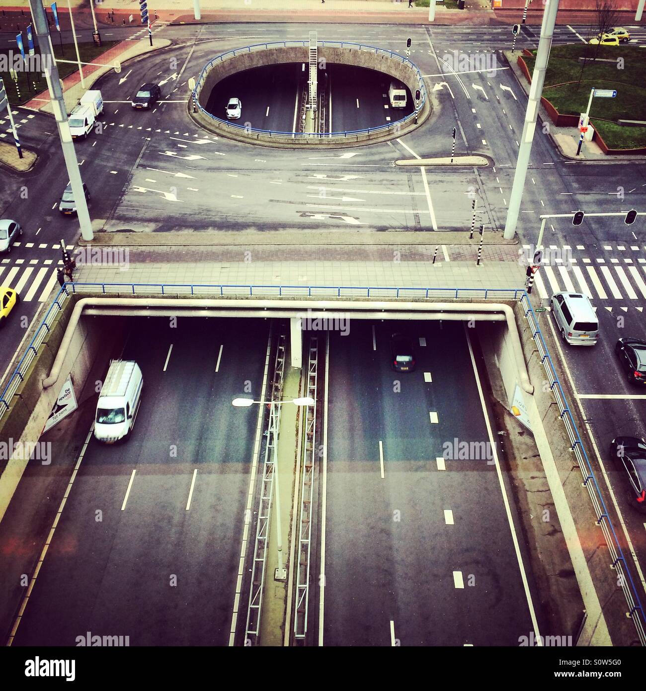 City infrastructure. The end of a highway entering a city - Smartphone Captured Stock Image