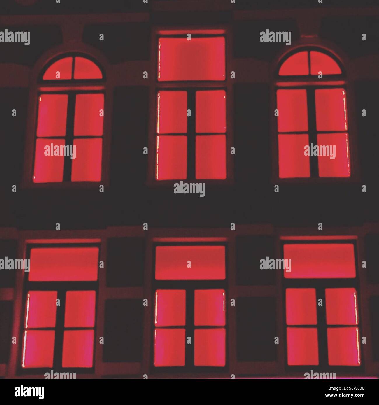 Red lights in Windows Stock Photo Alamy