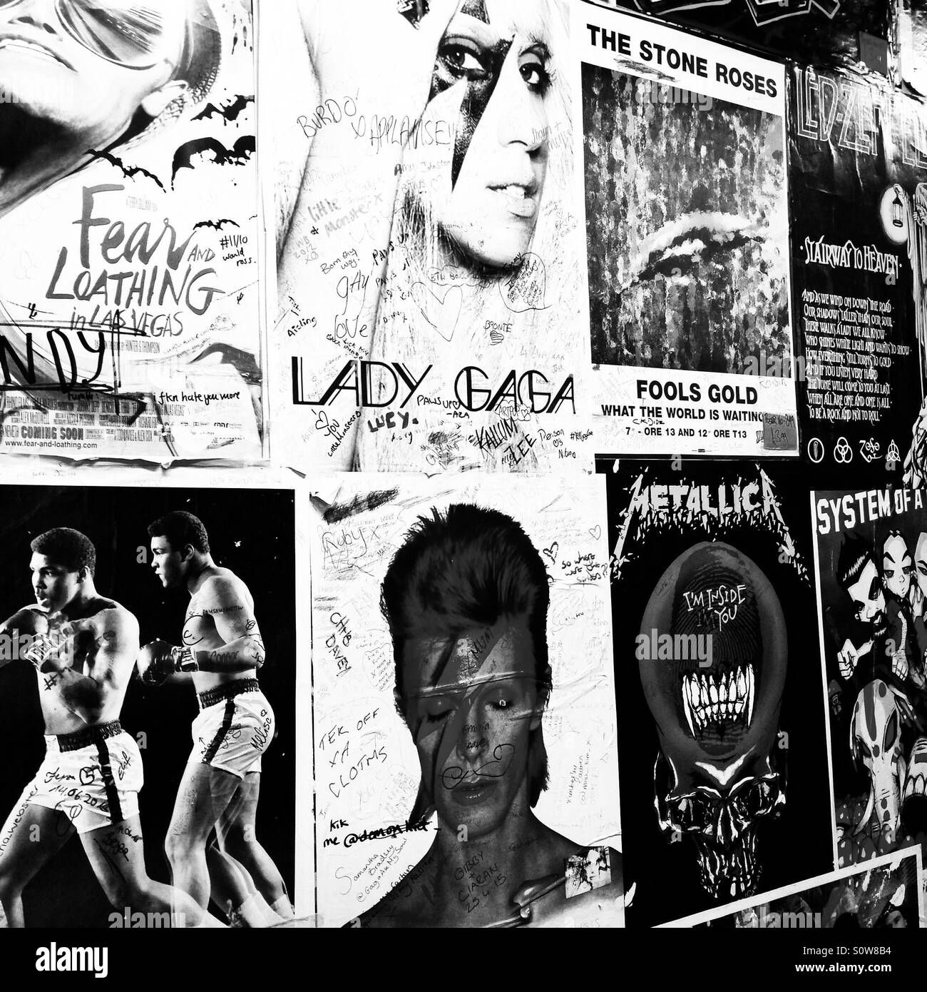 Graffitied posters in Afflecks Palace, Manchester Stock Photo