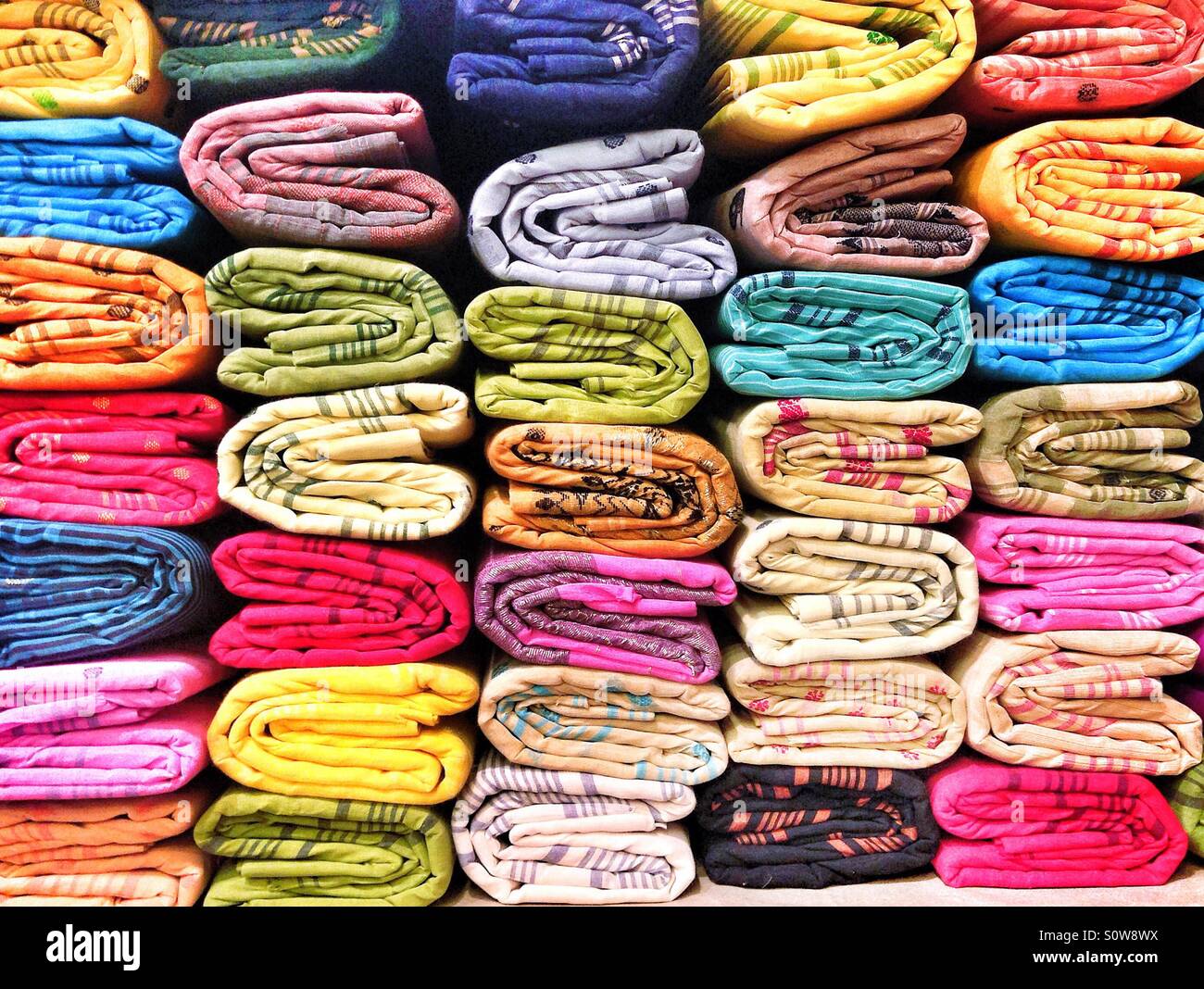 Stacks of saris Stock Photo