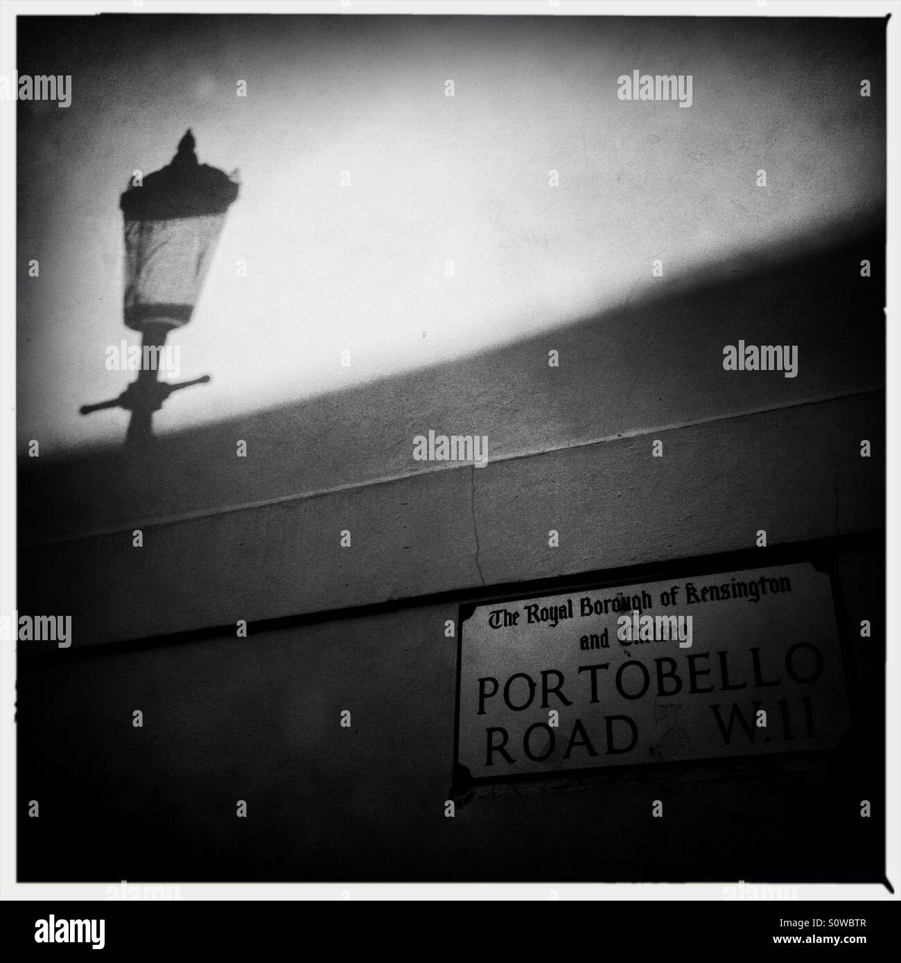 Portobello road sign and shadow of a lamp post in London England UK - Smartphone Captured Stock Image