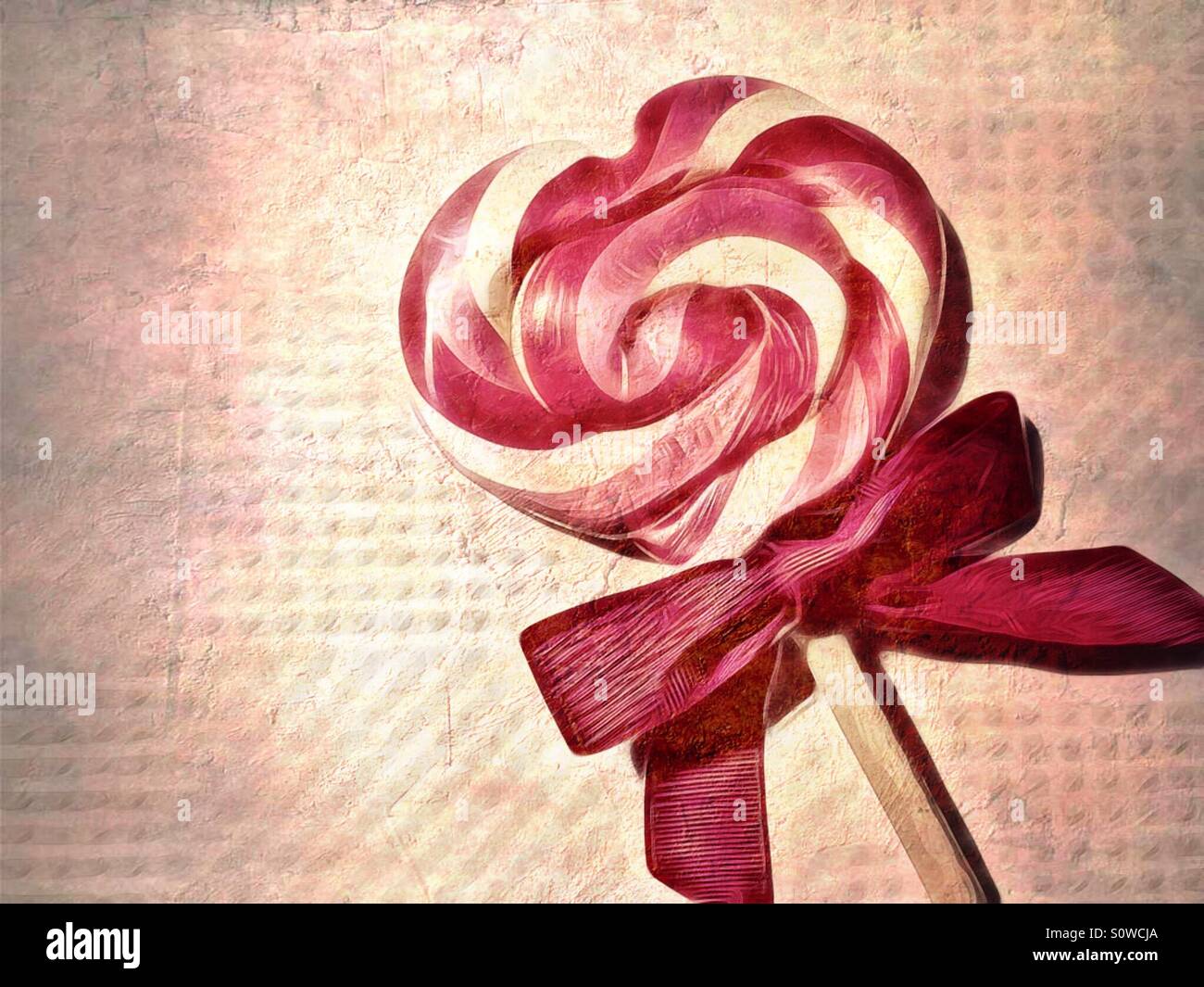 Heart shaped lollipop with red ribbon - Smartphone Captured Stock Image