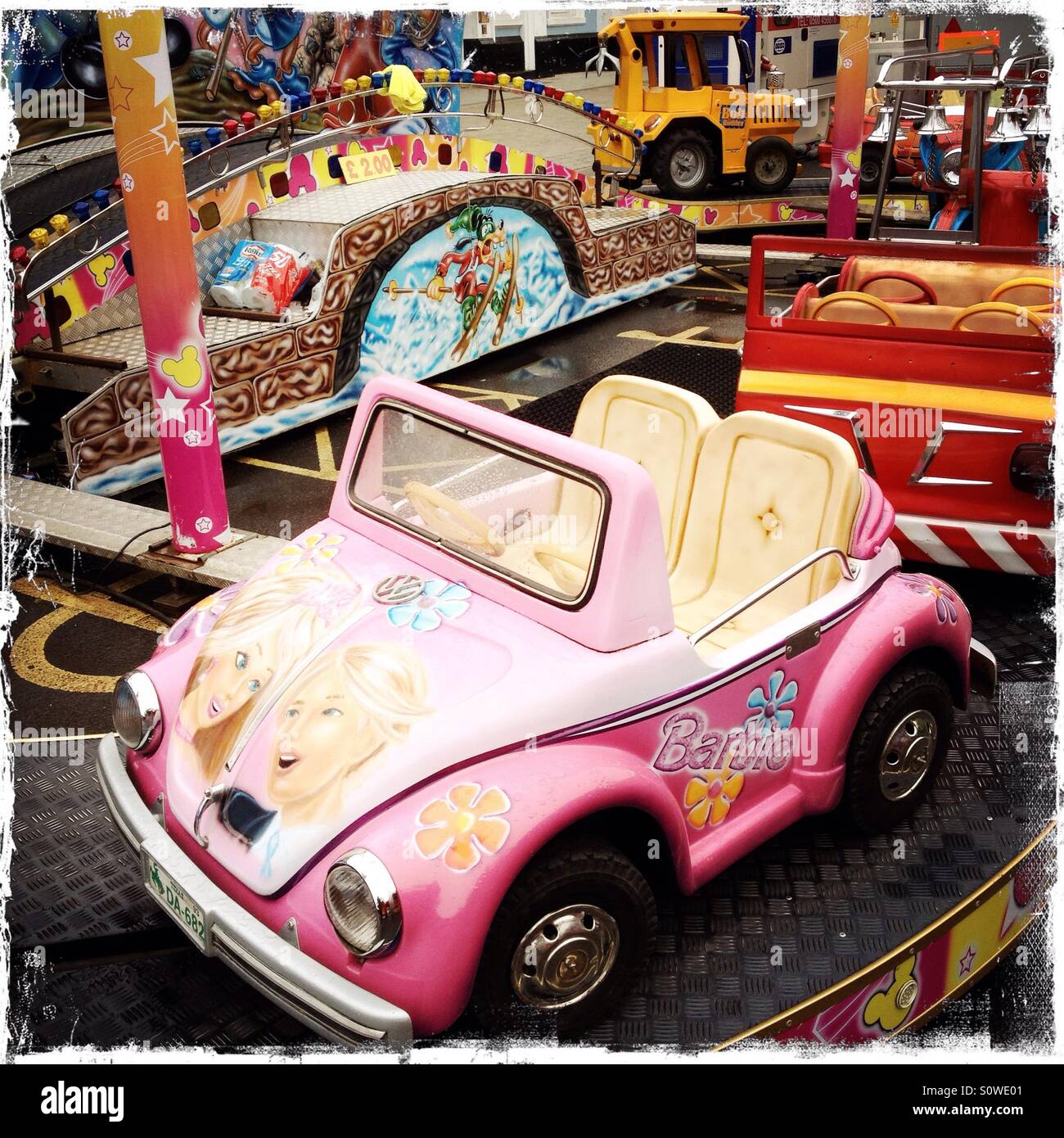 Roundabout for small children at fairground - Smartphone Captured Stock Image