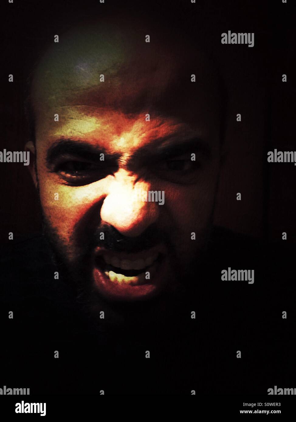 Angry man's face with beard - Smartphone Captured Stock Image