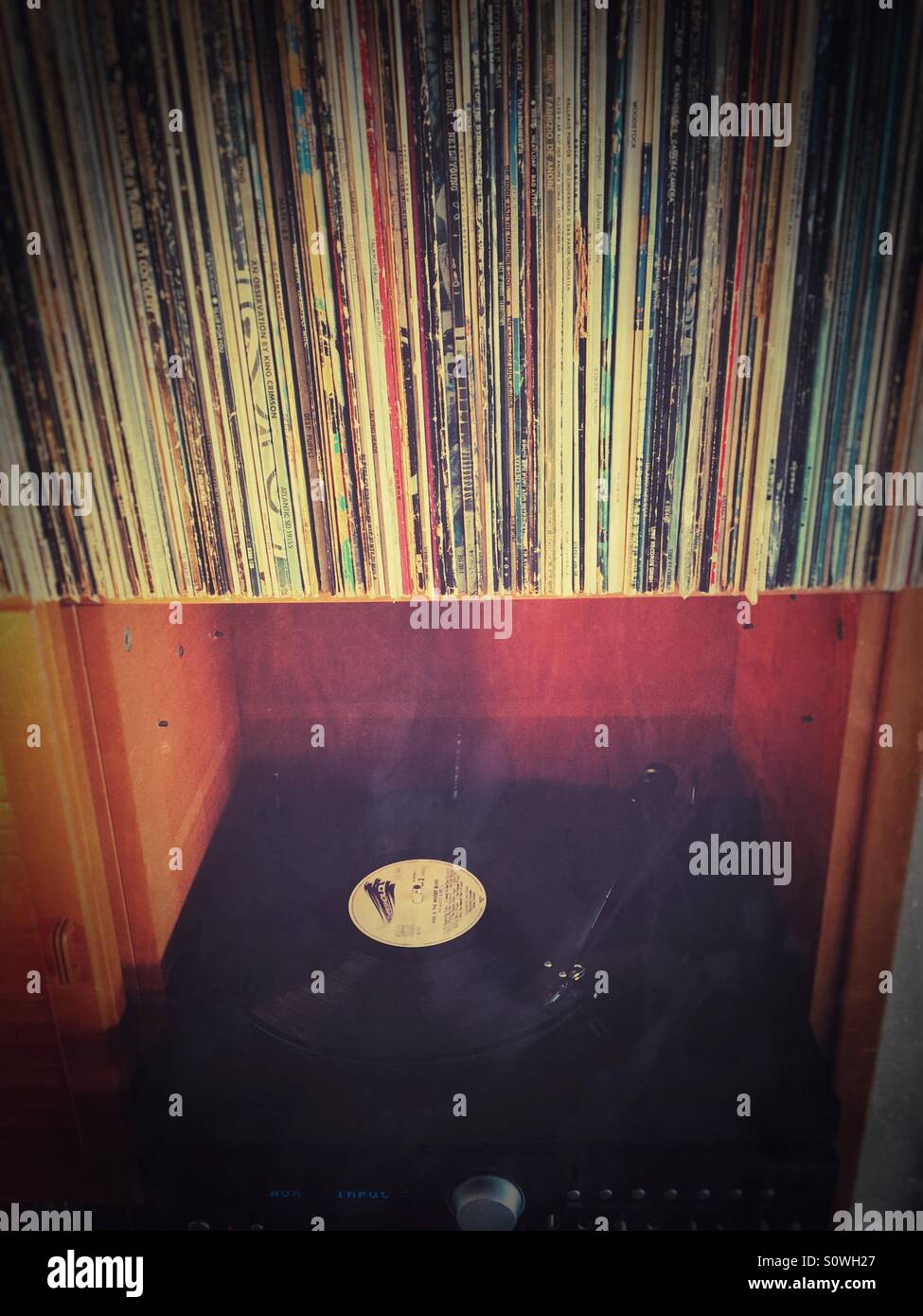 Record player playing vinyl record and collection Stock Photo - Alamy
