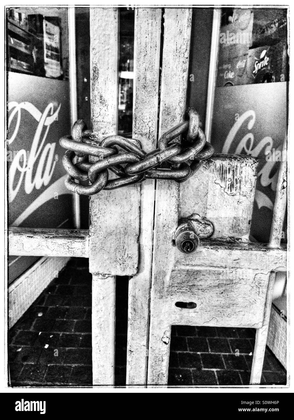 Chain on security gate of cafe. - Smartphone Captured Stock Image