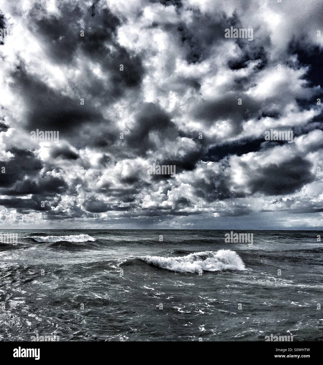 Rough sea and dramatic sky Stock Photo