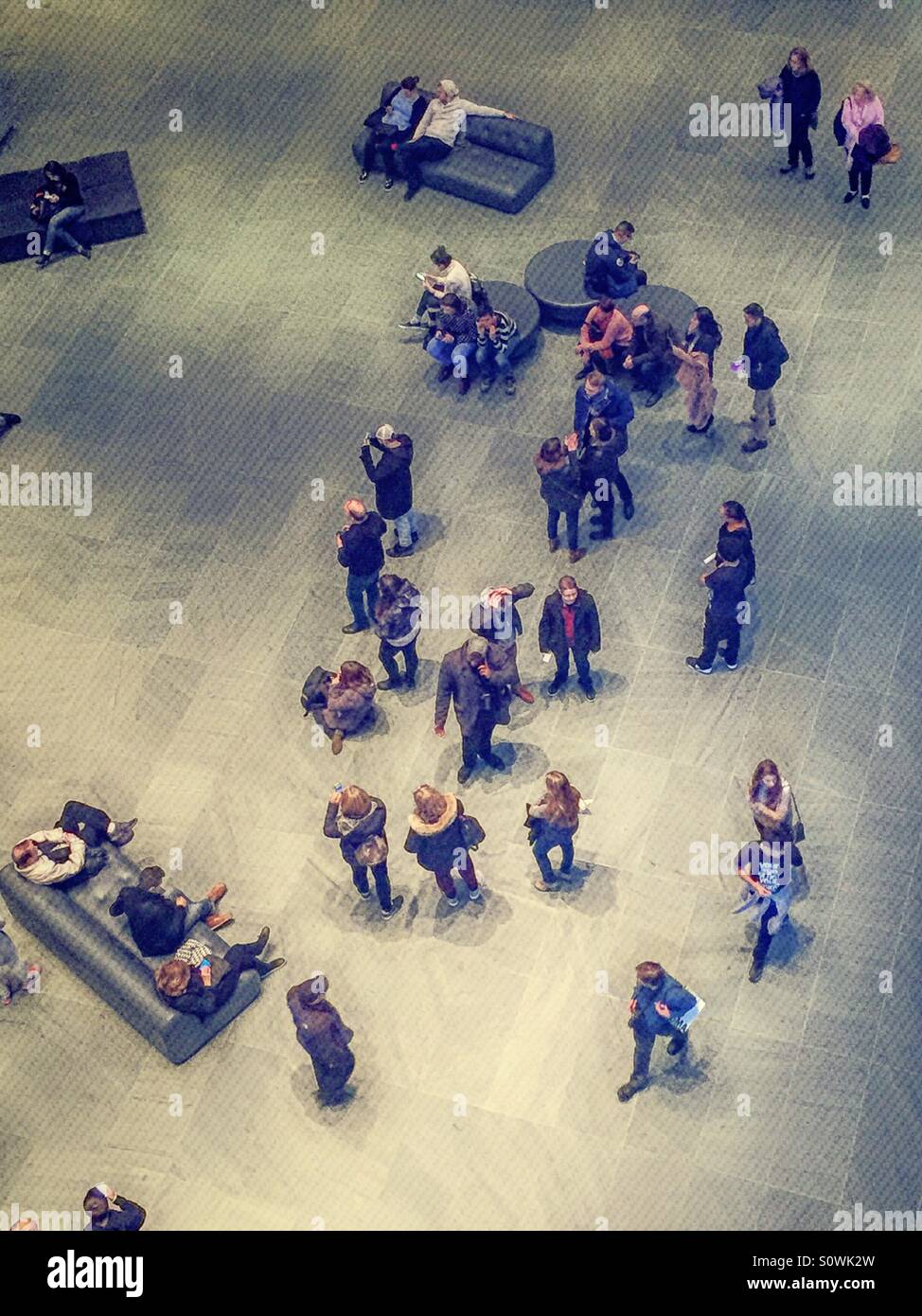 People gathered in a museum atrium shot from above Stock Photo