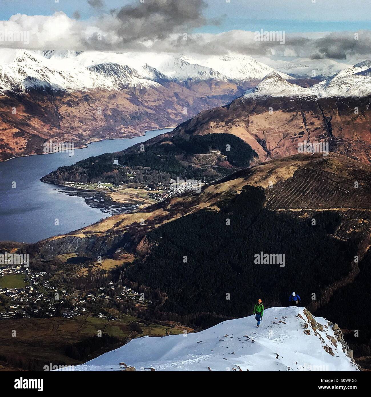 Two climbers on School House arête above Ballachulish in Glencoe Scotland UK - Smartphone Captured Stock Image