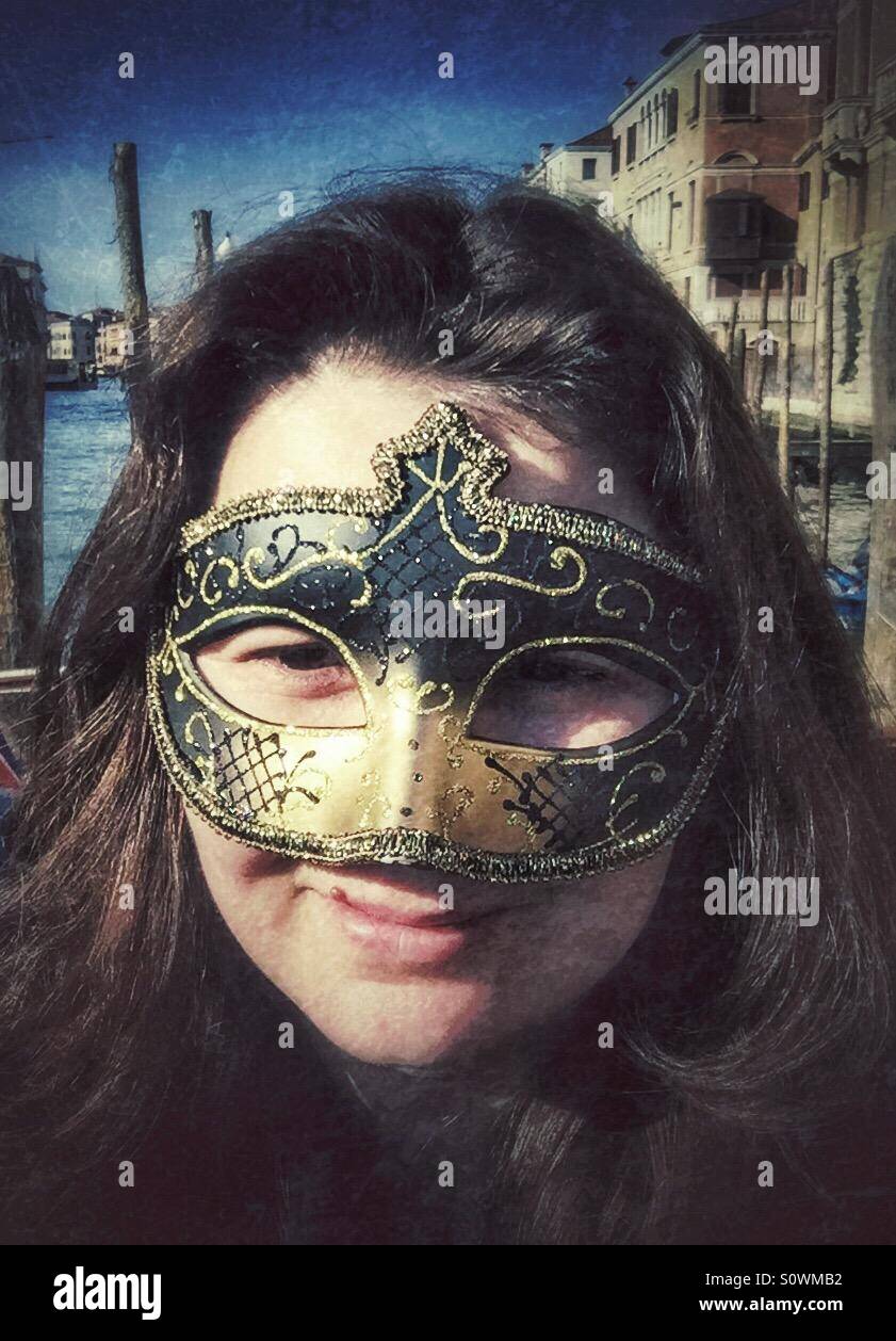 Tourist woman with venetian mask - Smartphone Captured Stock Image