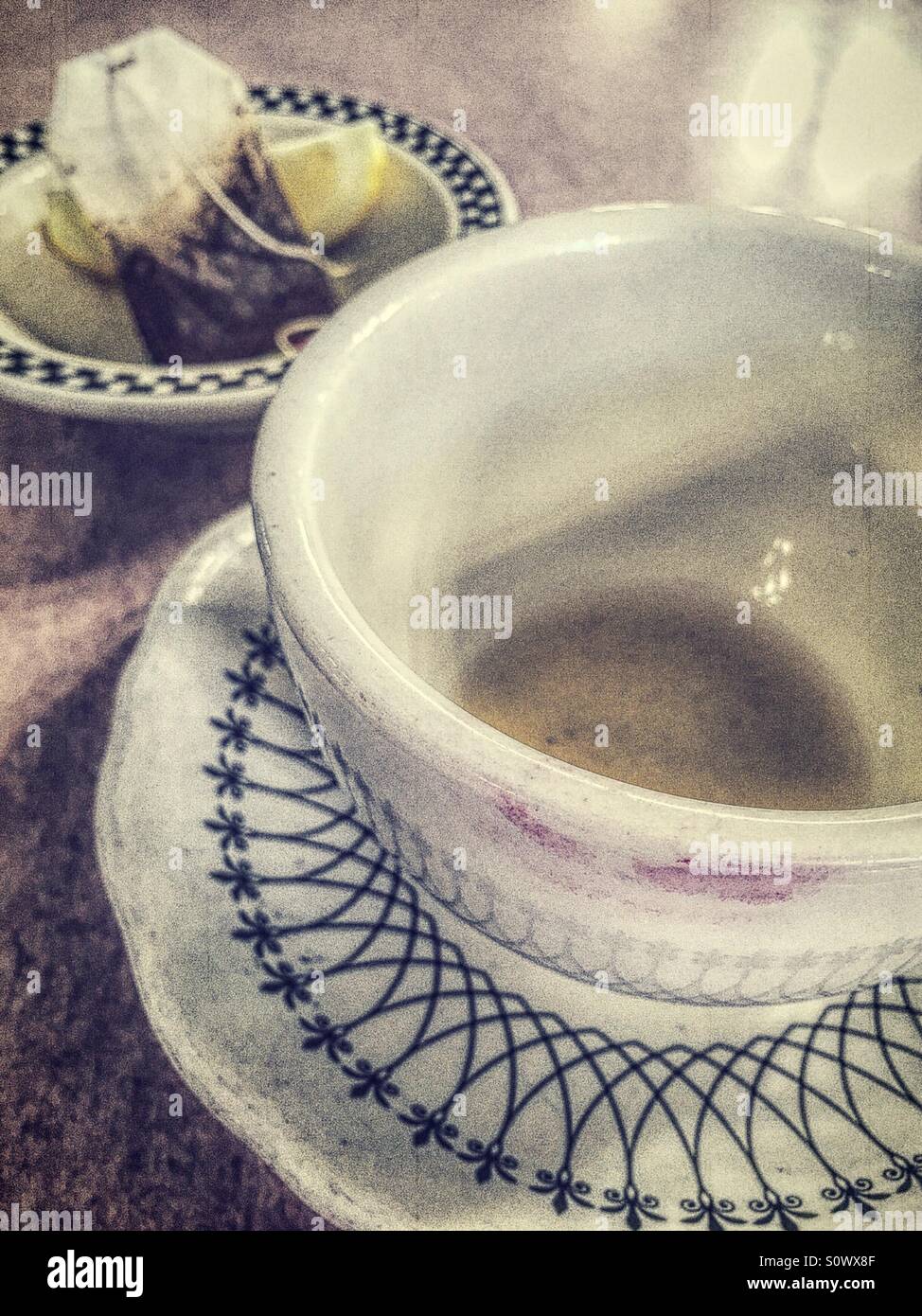 Diner teacup and saucer on table - Smartphone Captured Stock Image
