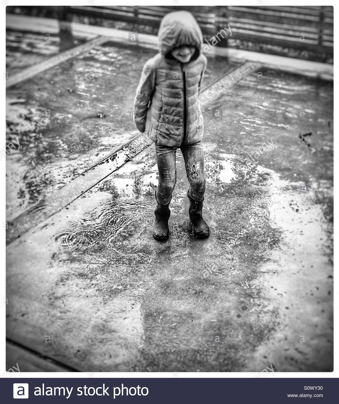 Kids Playing In Rain Stock Photos & Kids Playing In Rain Stock Images ...
