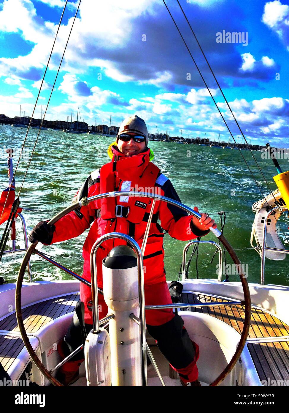 Sailing yacht man steering hi-res stock photography and images - Alamy