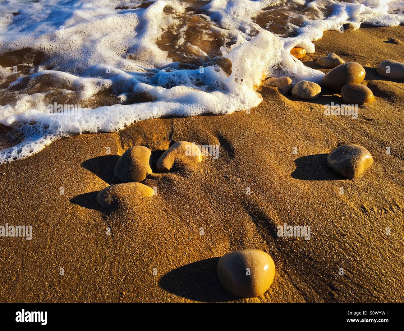 Beach surf on late afternoon light - Smartphone Captured Stock Image