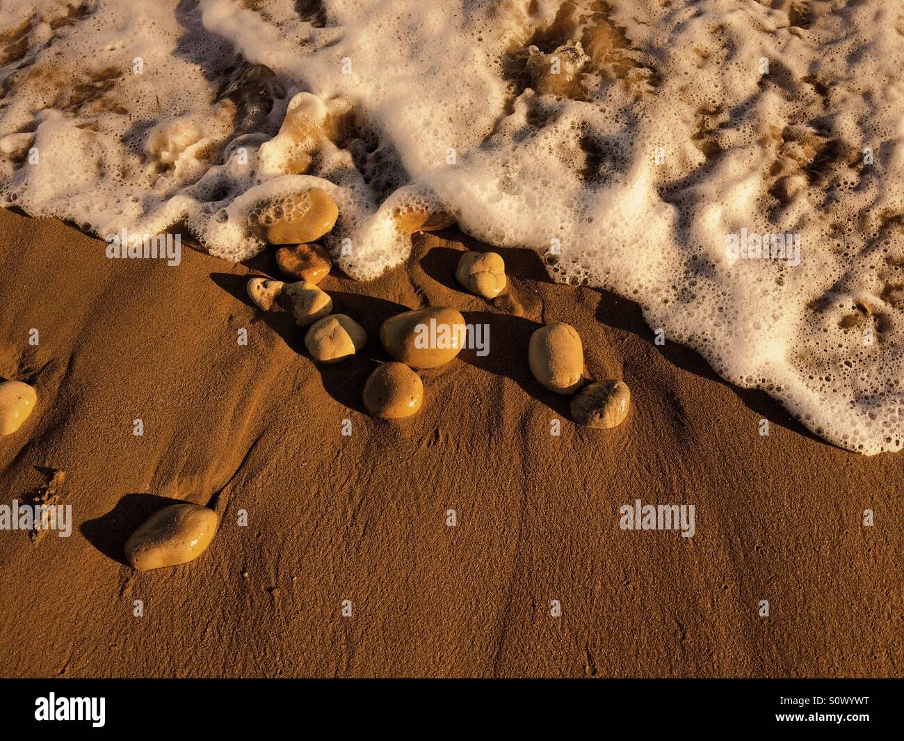 Detail of surf rechina the beach - Smartphone Captured Stock Image
