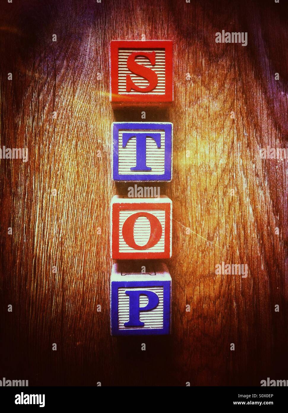 Toy bricks spelling the word stop - Smartphone Captured Stock Image