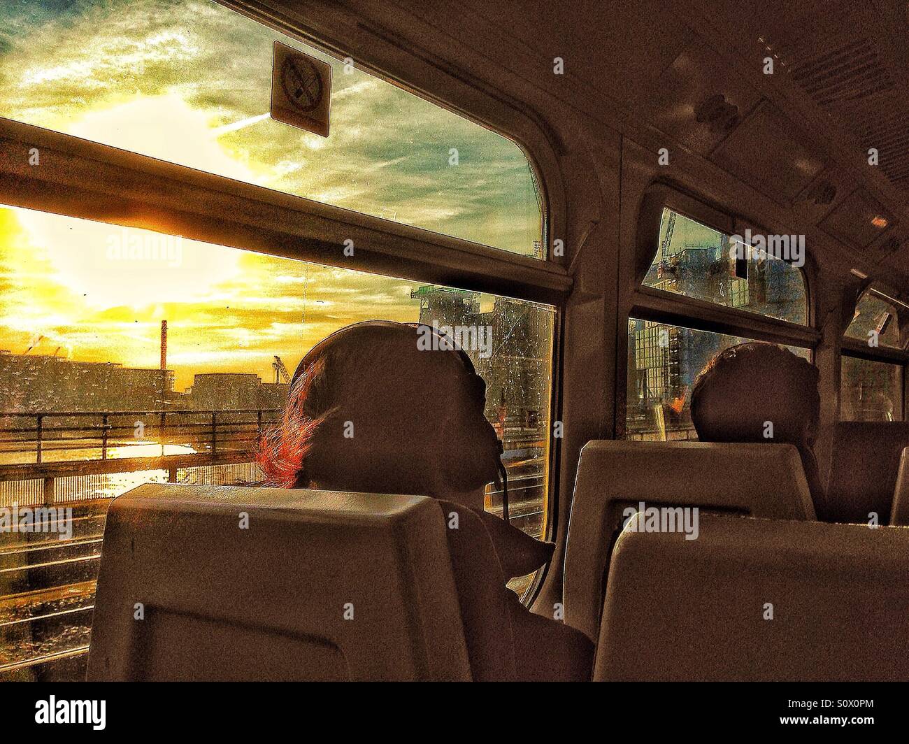 Commuters on the train at Battersea. - Smartphone Captured Stock Image