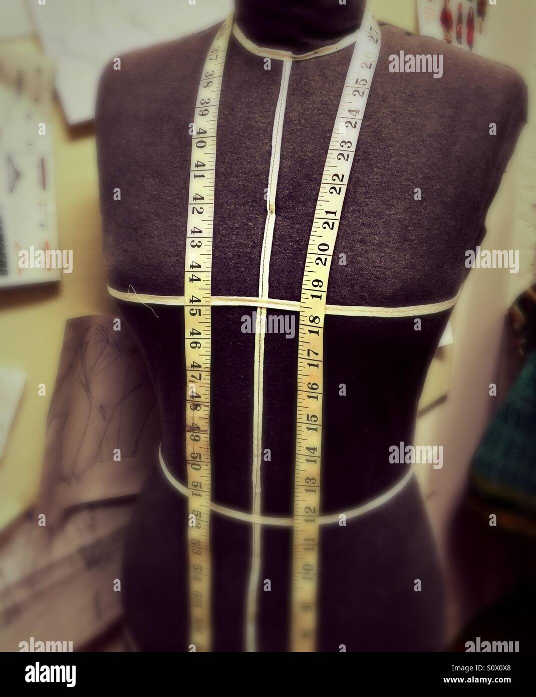 dress form with tape measure Stock Photo Alamy