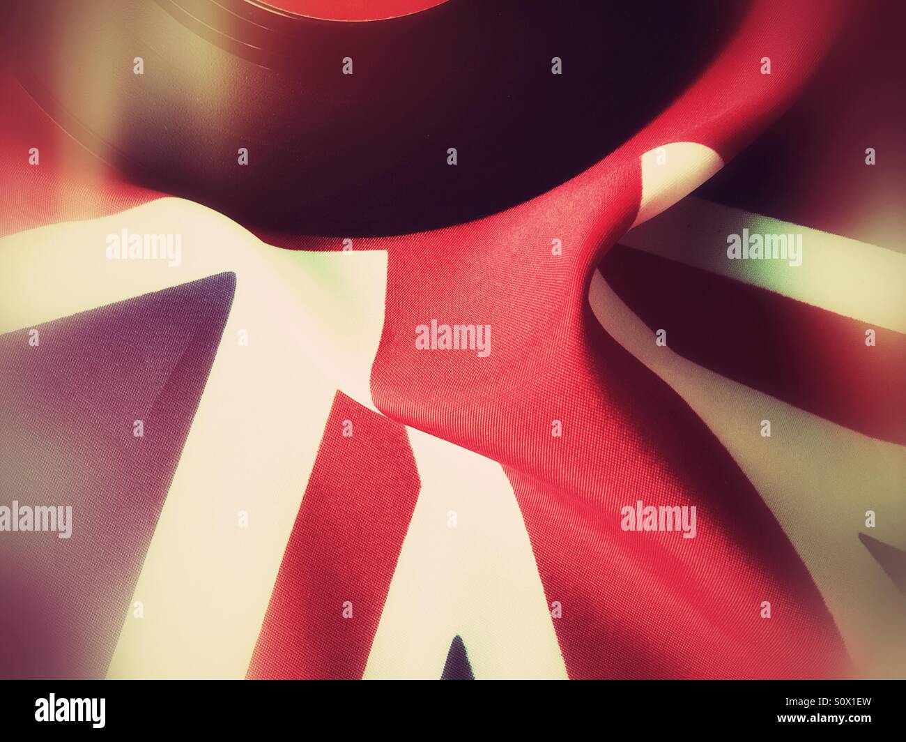 Vinyl record on British flag - Smartphone Captured Stock Image