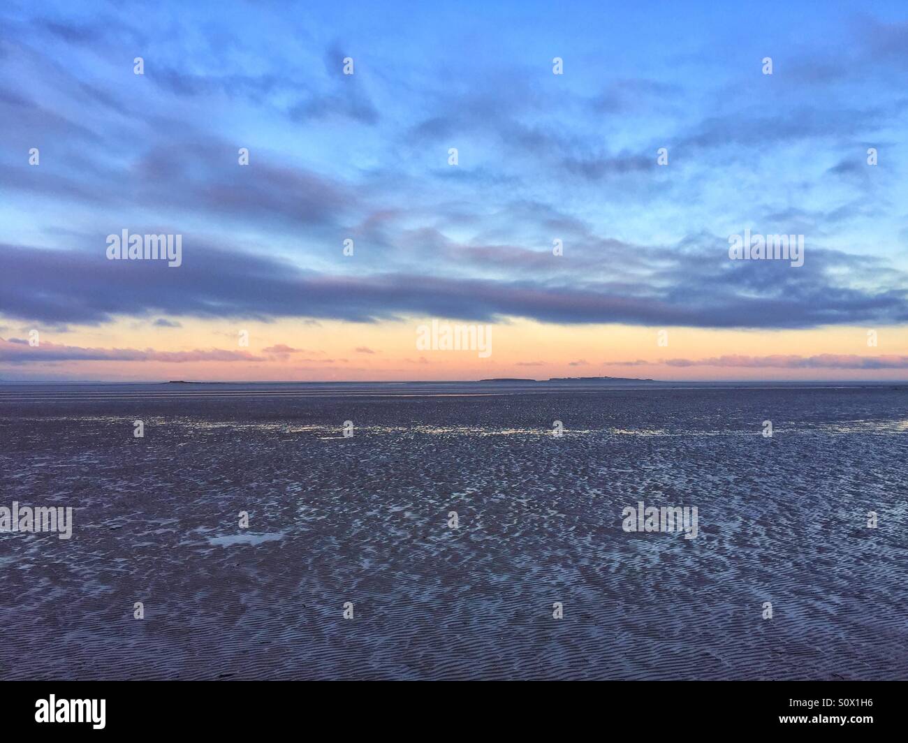 Dawn at Hilbre Island Stock Photo