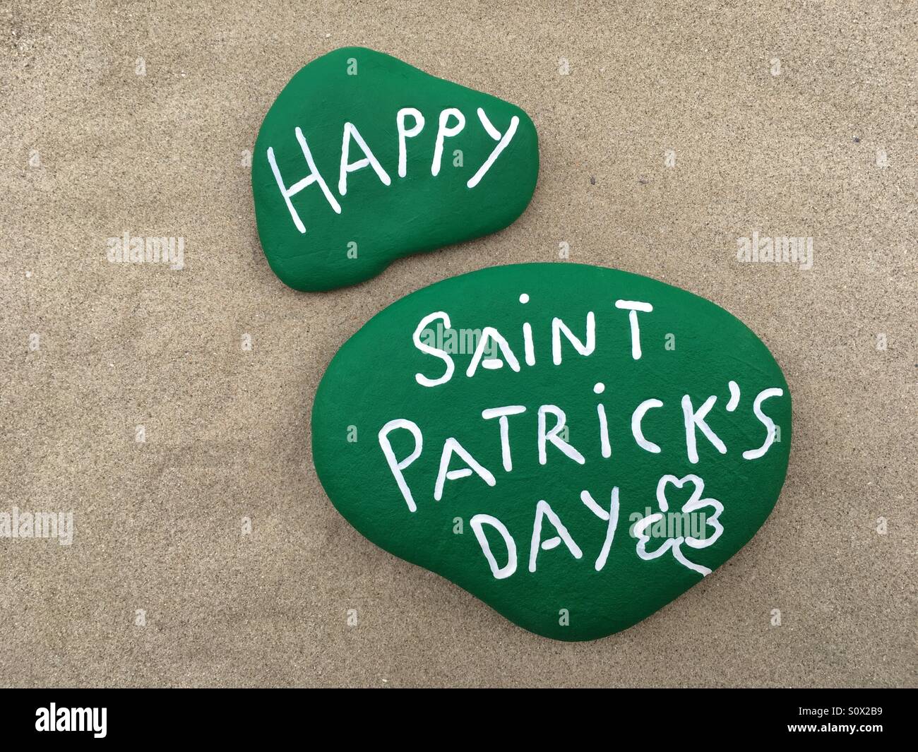 Happy Saint Patrick's Day, souvenir on colored stone - Smartphone Captured Stock Image