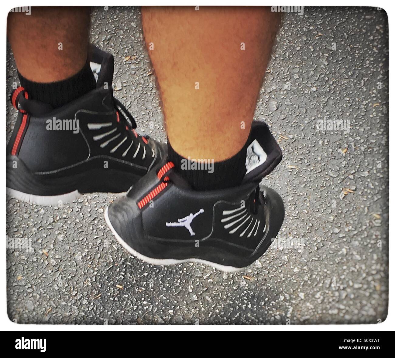 Jumping feet off the ground Stock Photo Alamy