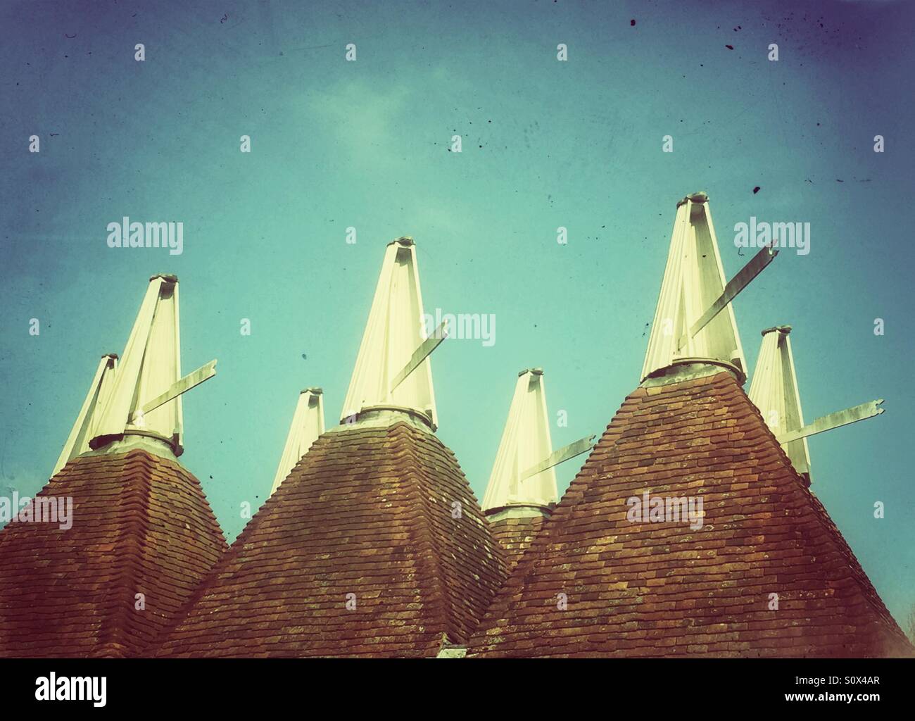 English Daleks? Traditional Oast  house roofs in Kent, South East England - Smartphone Captured Stock Image