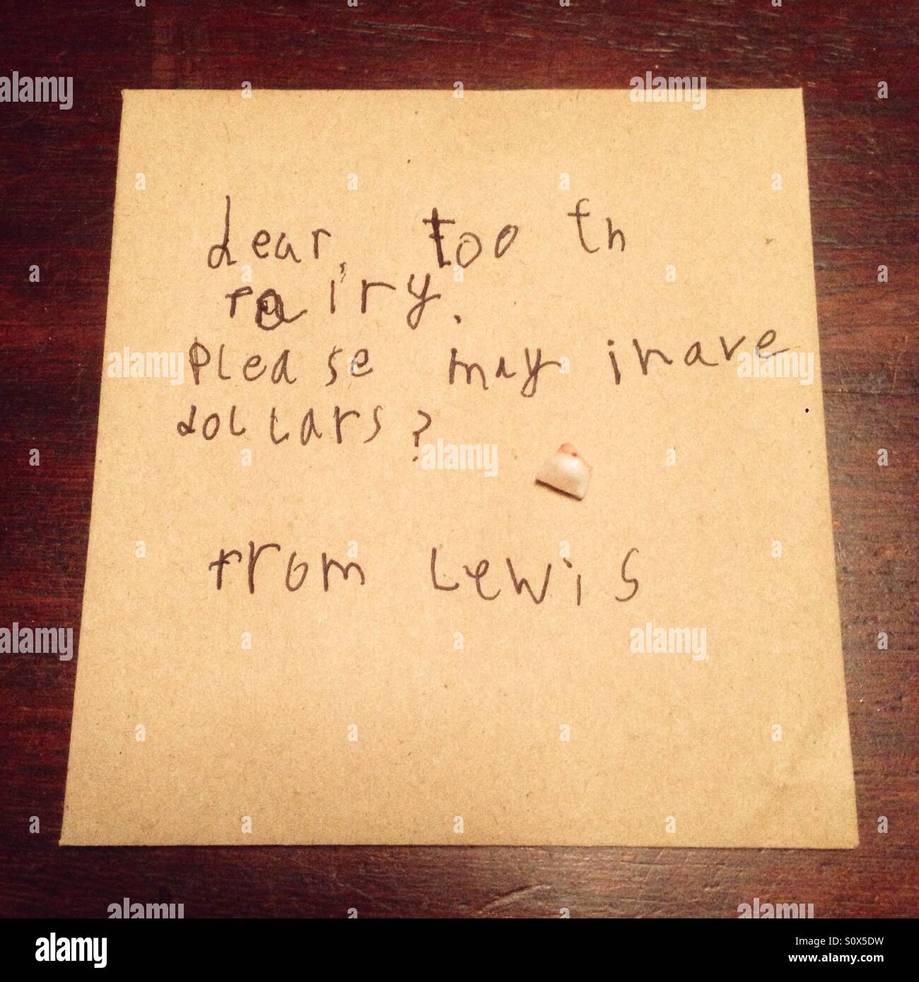 Letter to the tooth fairy - Smartphone Captured Stock Image