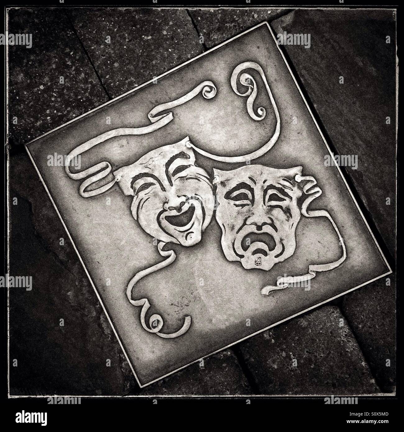 Theatre brass plaque on the street, Harrogate, UK. - Smartphone Captured Stock Image