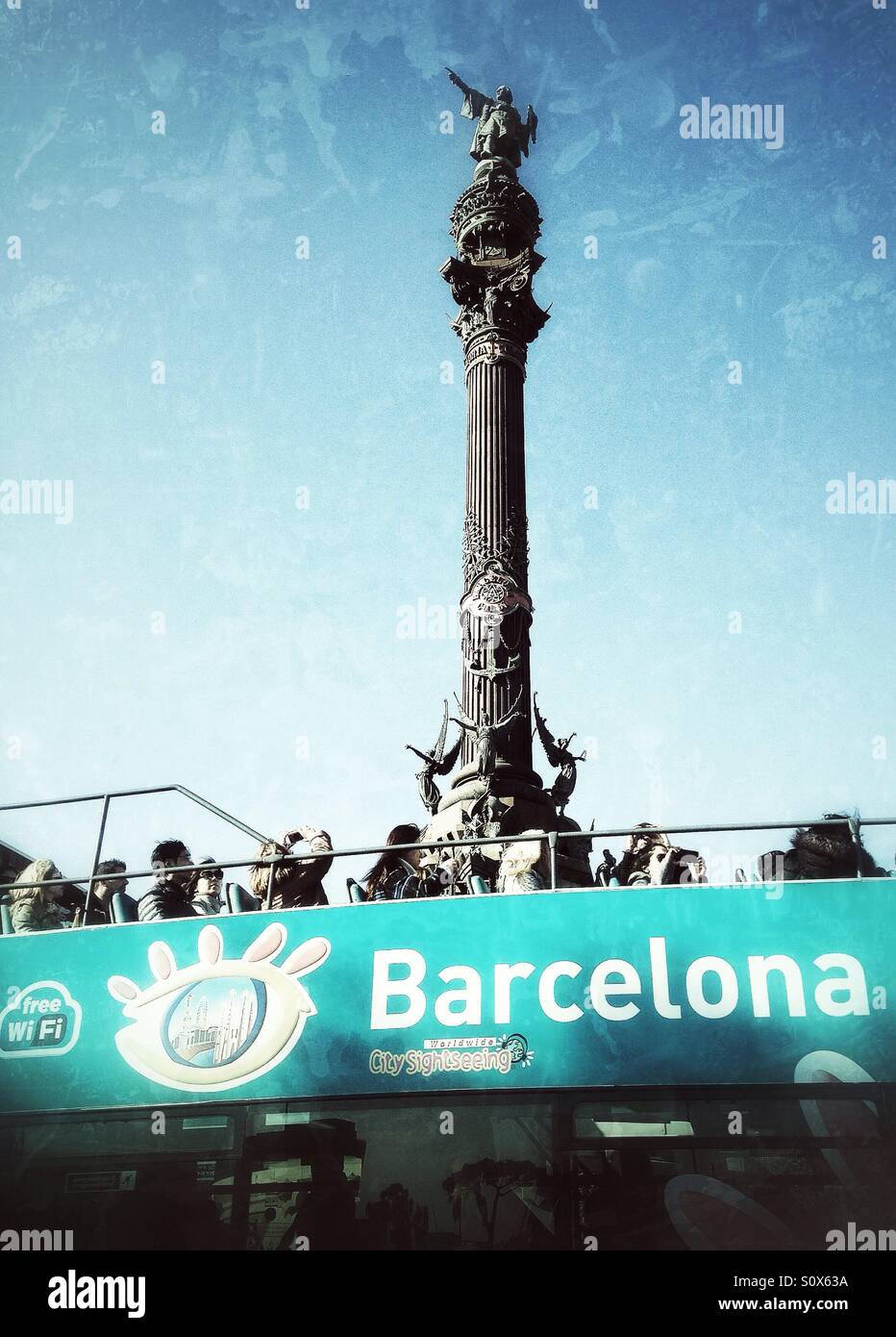 Tourist bus in Barcelona near Columbus monument - Smartphone Captured Stock Image