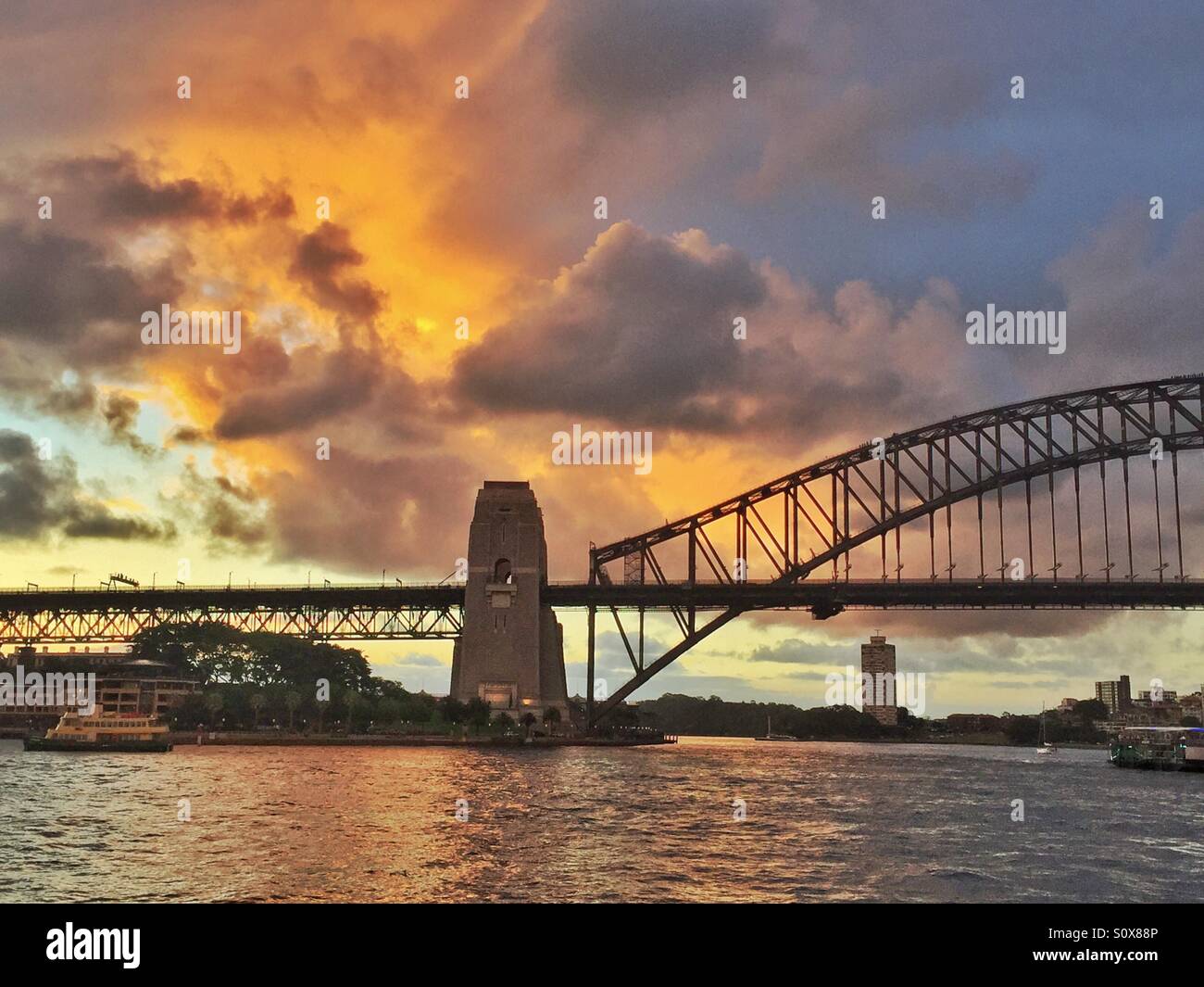 Colorful Clouds Passing The Sydney Harbour Bridge Stock Photo   Alamy