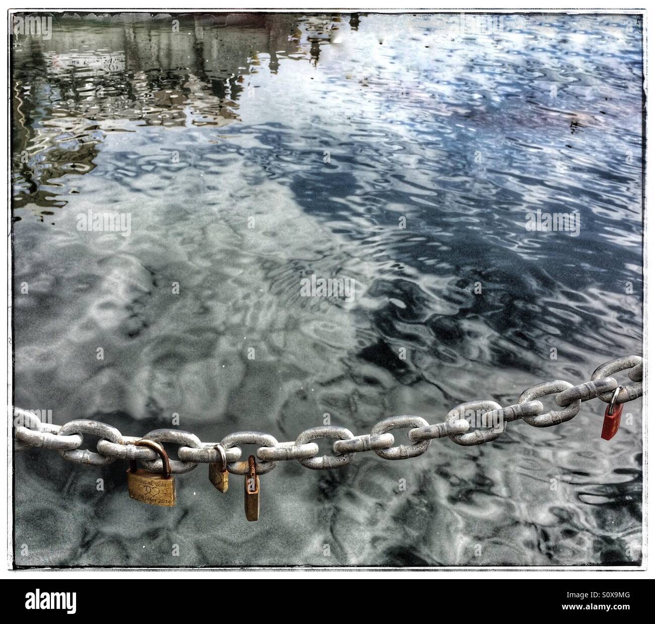 Locks on chain. - Smartphone Captured Stock Image