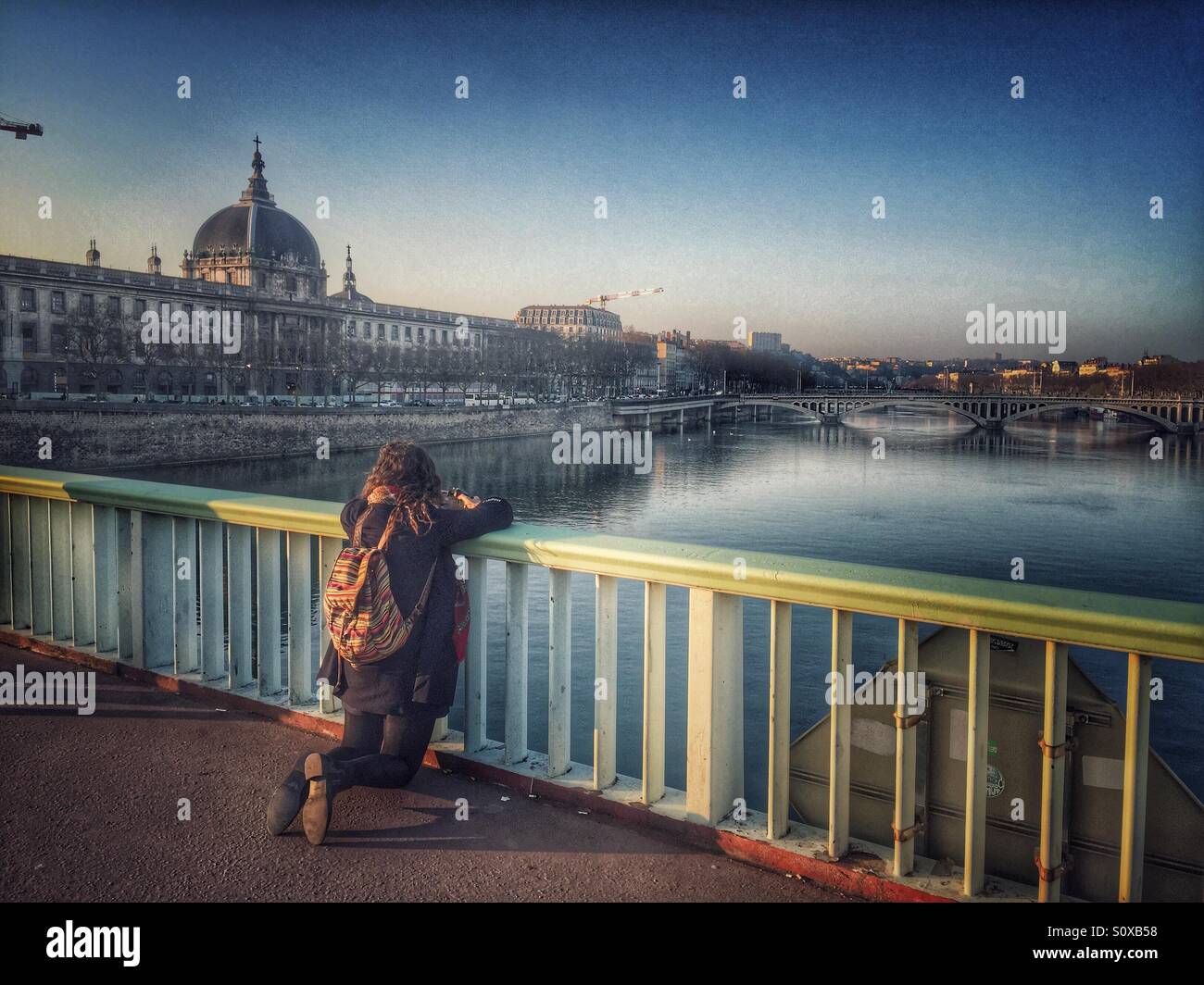 Tourist photographing Lyon France - Smartphone Captured Stock Image