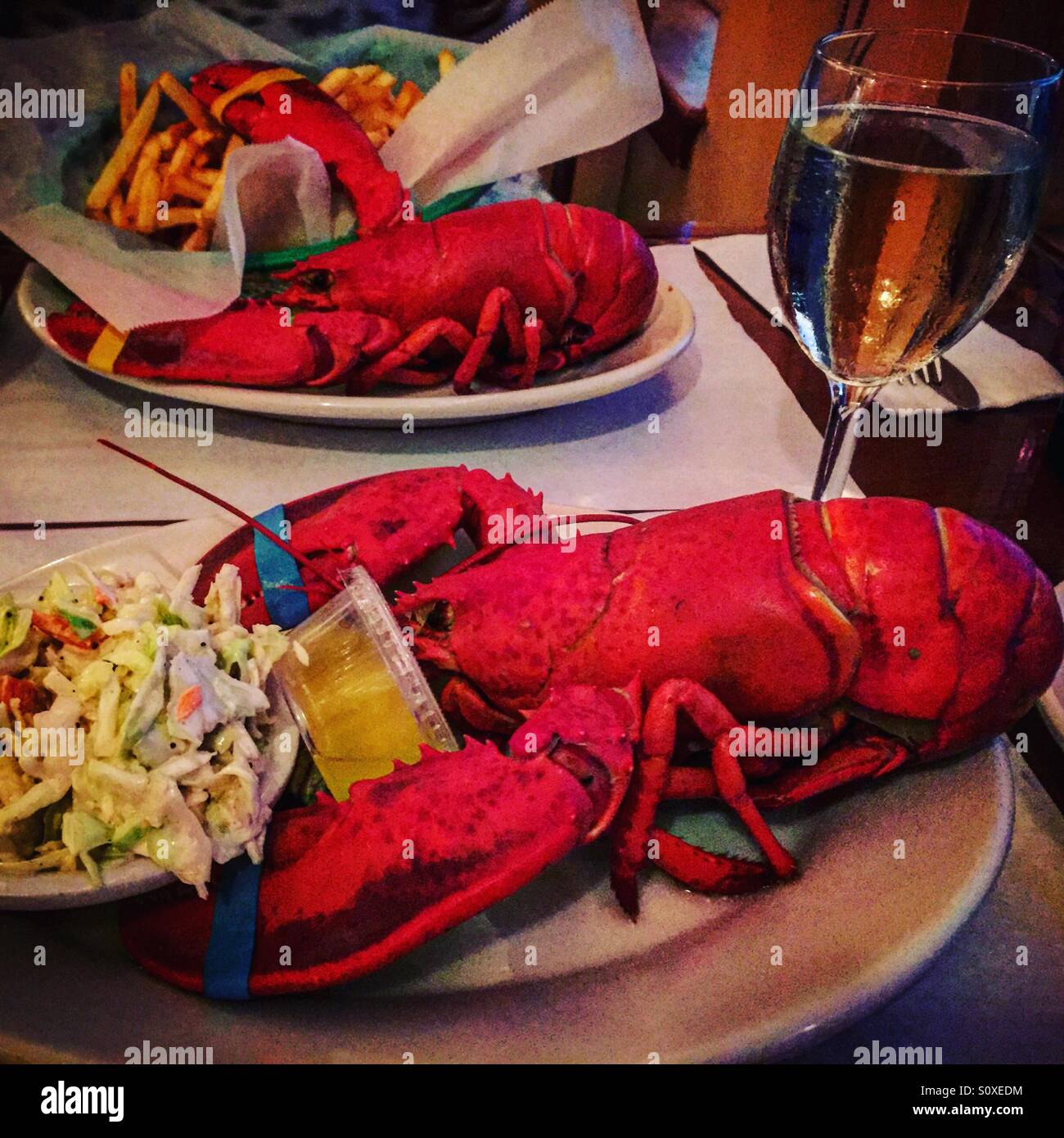 Whole lobster meal in Maine Stock Photo Alamy
