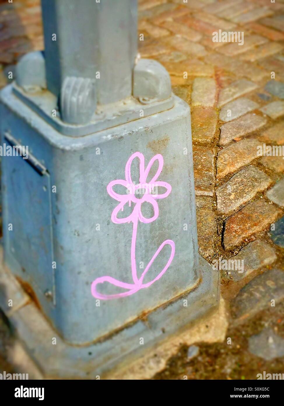 Flower painted on lamppost - Smartphone Captured Stock Image