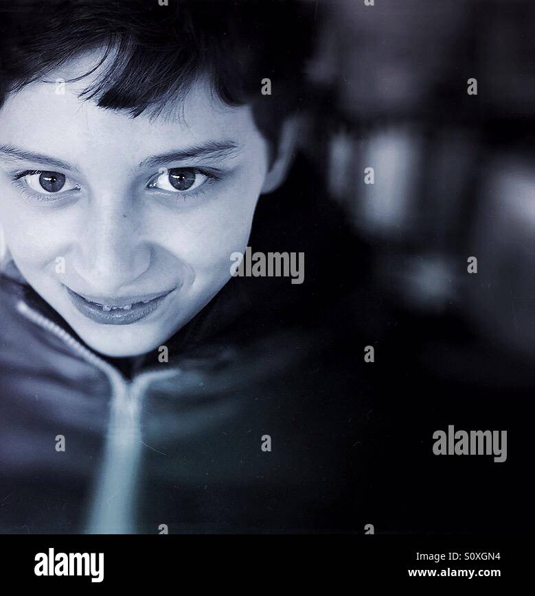 Smiling boy with bright eyes - Smartphone Captured Stock Image