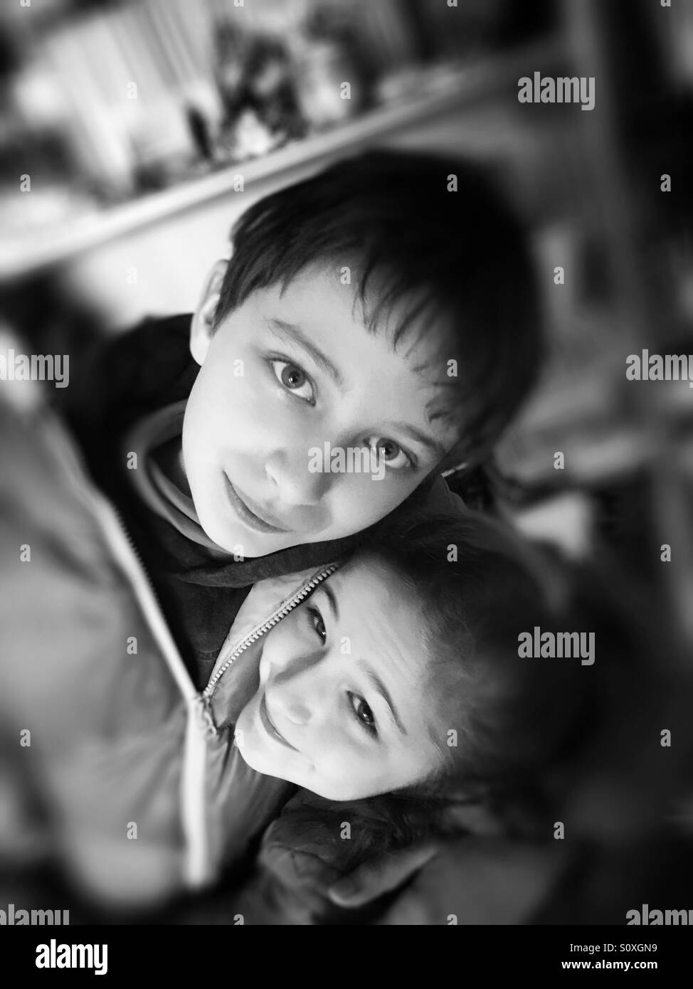 Brother and sister loving embrace Stock Photo