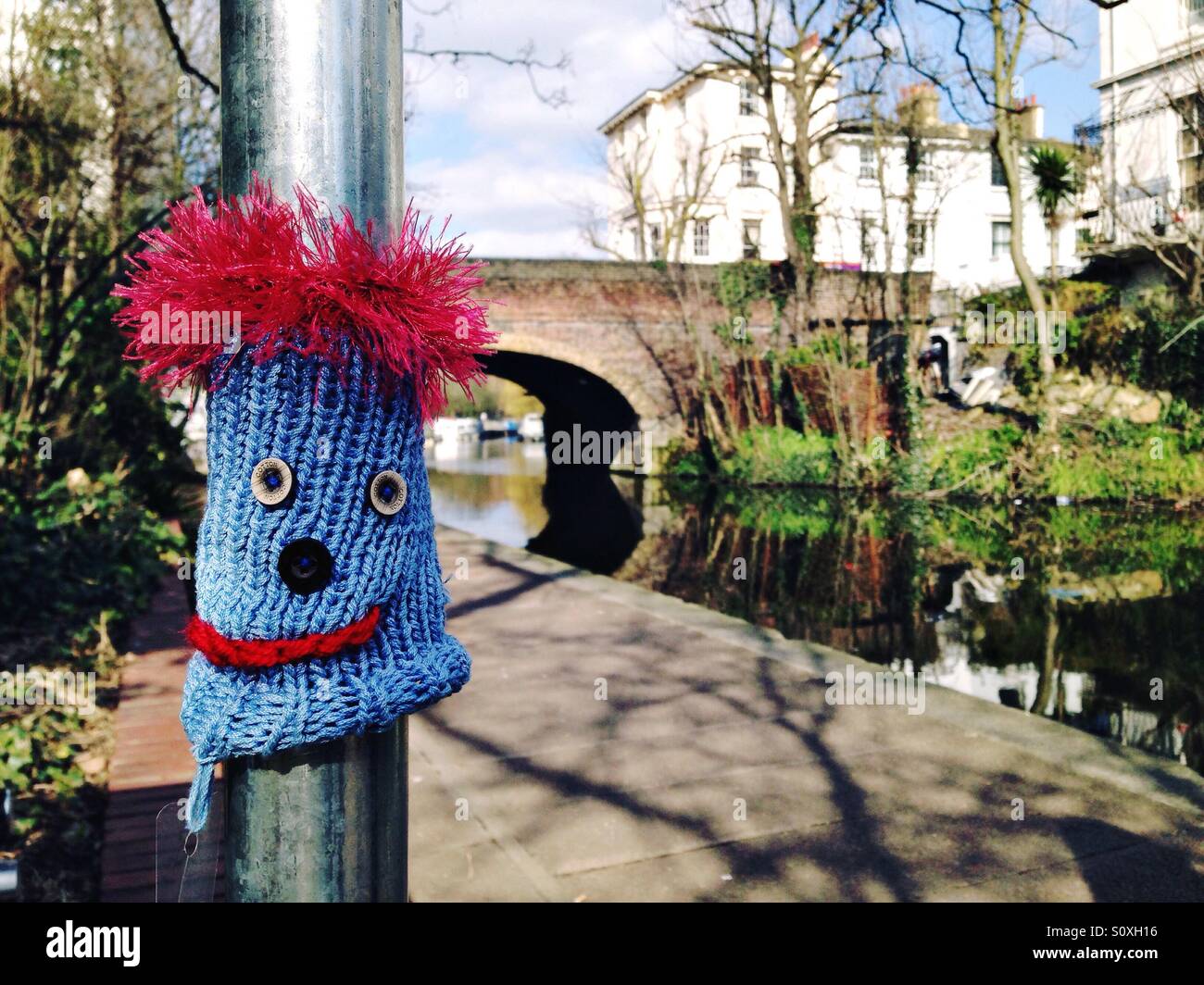Yarn bombing street art next to Regent's Canal in Camden Town, London, UK Stock Photo