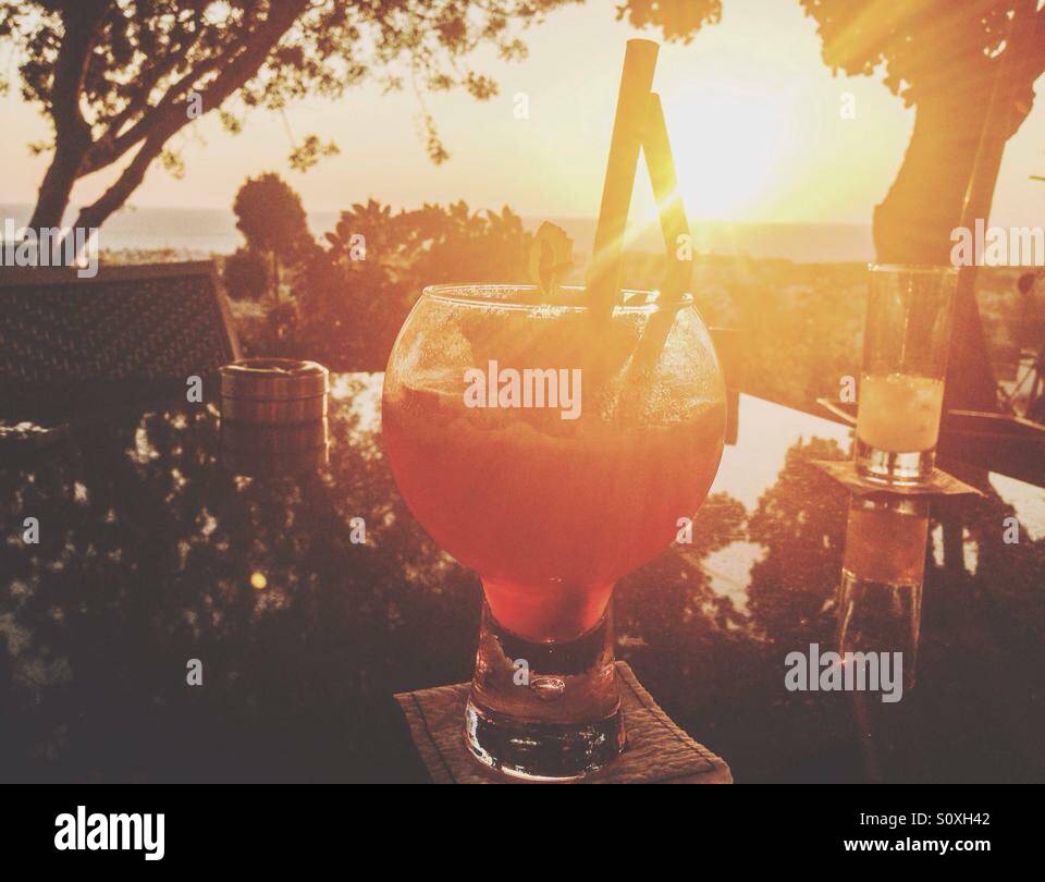 A cocktail and a sunset view - Smartphone Captured Stock Image