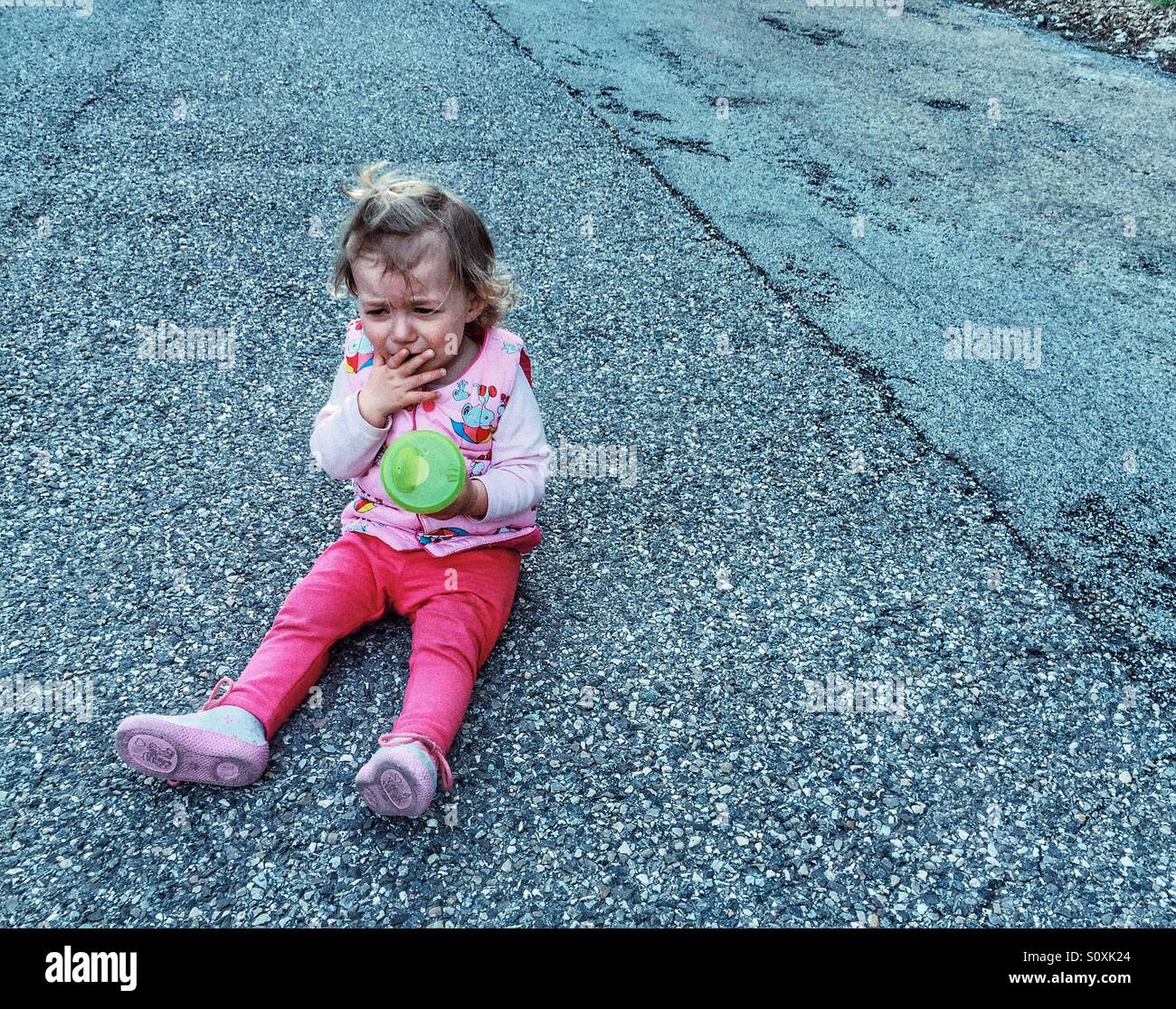 Unhappy baby girl Stock Photo