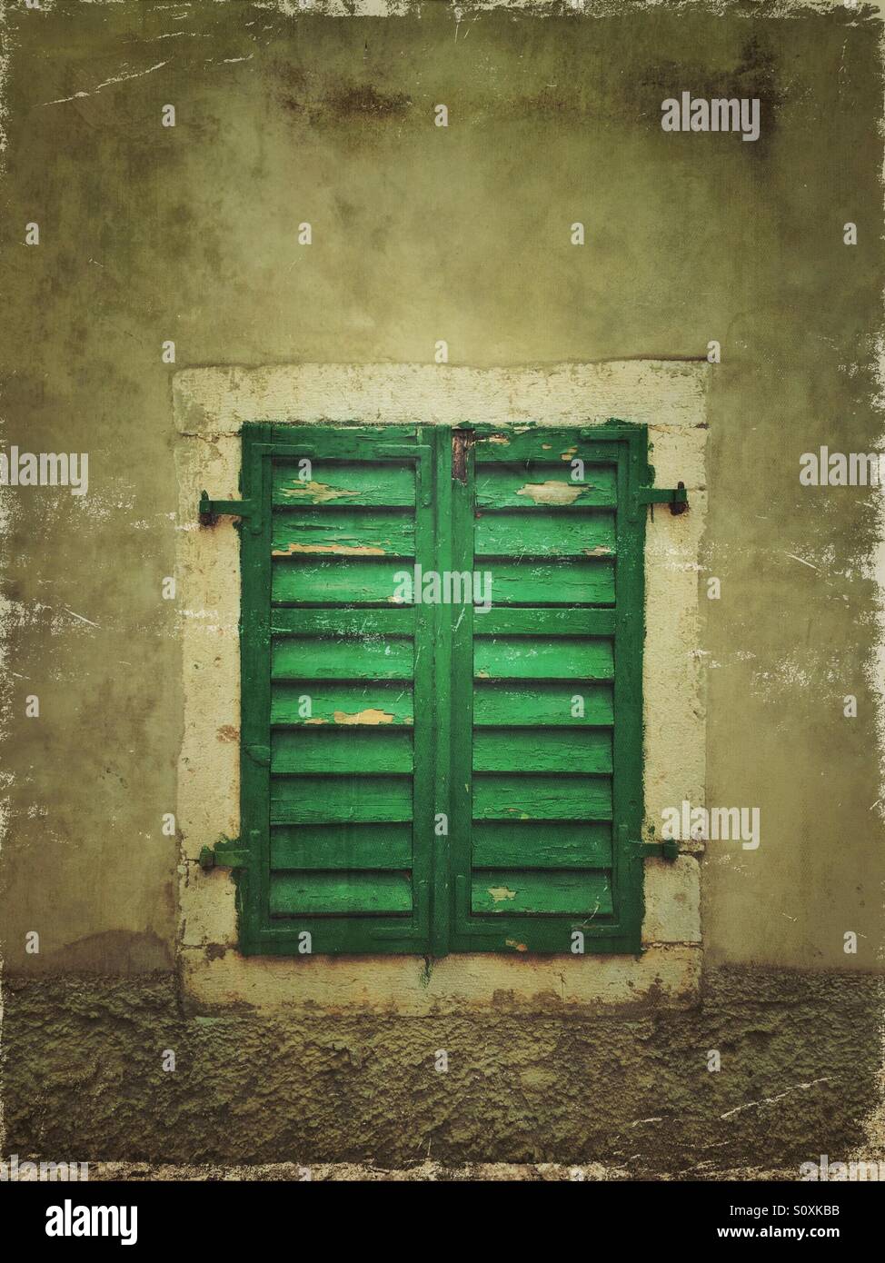 Old window with green shutters - Smartphone Captured Stock Image